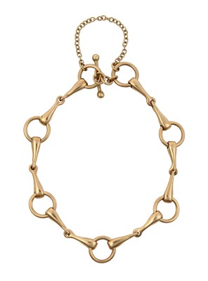 Lot 2218 - A Snaffle Bit Bracelet of yellow plain...