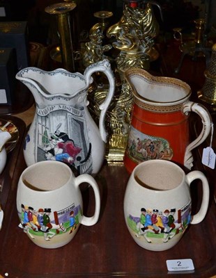 Lot 2 - Brass Punch and Judy door stop, 19th century jug, two mugs, Victorian 'Load of Mischief' jug