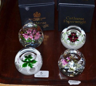 Lot 5 - Four Caithness paperweights