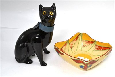 Lot 6 - A Clarice Cliff Bizarre pottery bowl (a.f.) and a Bretby black glazed figure of a cat with...