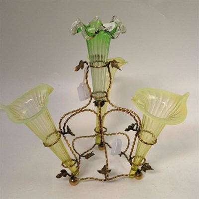 Lot 12 - A green vaseline epergne (one matched flute)