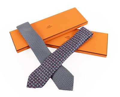 Lot 1046 - Hermés Silk Tie woven with pale blue tigers...