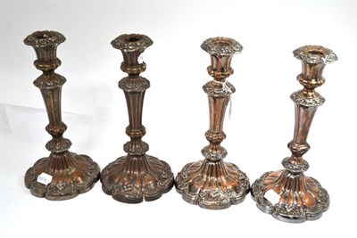 Lot 19 - Four silver plated candlesticks