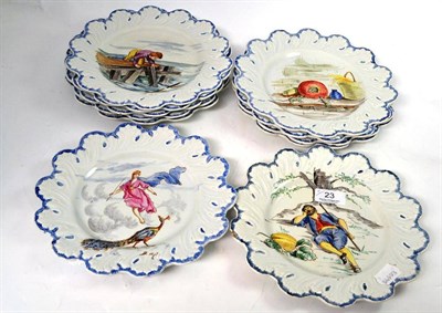 Lot 23 - A set of eleven 19th century French faience plates, 23.5cm diameter