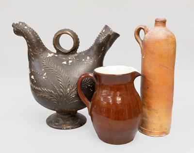 Lot 251 - A Country Pottery Zoomorphic Flagon, formed as...