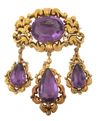 Lot 2377 - A Victorian Amethyst Brooch the oval mixed cut...
