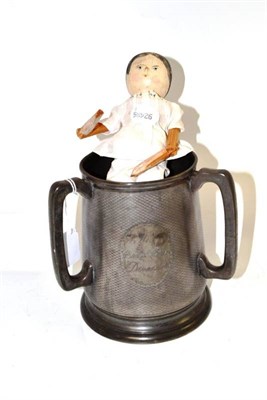 Lot 40 - Pewter tyg with inscription 'Doncaster Grandstand' and a peg doll