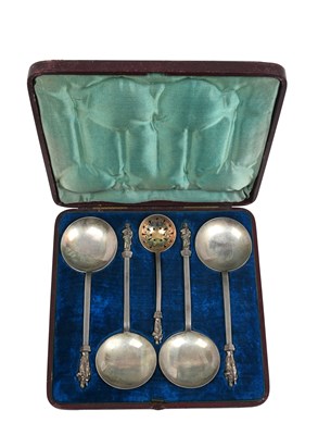 Lot A Cased Set of Four Victorian Silver Apostle Serving-Spoons and a Sifting-Spoon