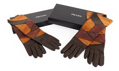 Lot 1059 - Two Pairs of Dark Brown Prada Leather Gloves,...