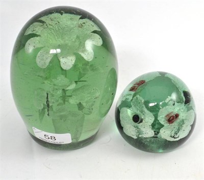 Lot 58 - J Kilner green glass coloured sulphide dump (marked to base) and another larger (2)