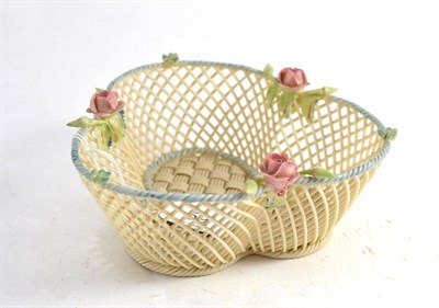 Lot 59 - A Belleek trefoil basket, 16cm long