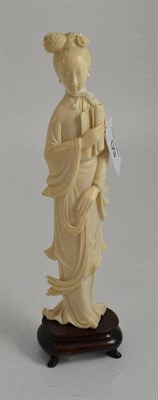 Lot 60 - Chinese carved ivory figure of Quanyin on wood base