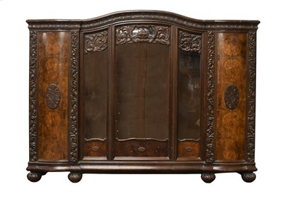 Lot 1323 - A Continental Carved Oak and Figured Walnut...