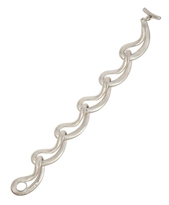 Lot 2301 - A Silver Infinity Bracelet, designed by...