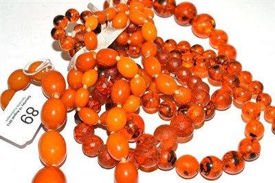 Lot 89 - Three amber and other necklaces