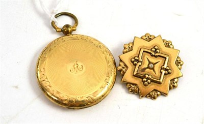 Lot 96 - An engraved locket and a seed pearl set brooch