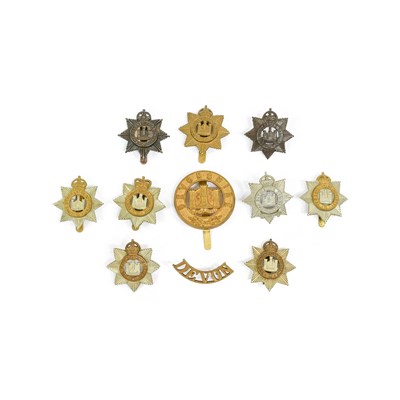 Lot 92 - Eleven Badges to the Devonshire Regiment - a...