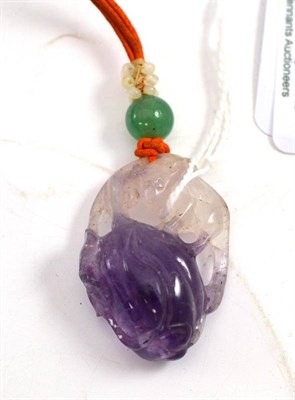 Lot 106 - Carved amethyst pendant