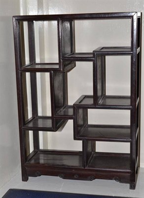 Lot 112 - A set of Chinese hardwood display shelves, 37cm high