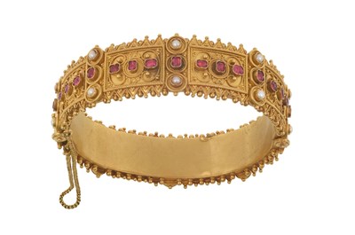 Lot 2021 - A Ruby and Split Pearl Bangle, circa 1860...
