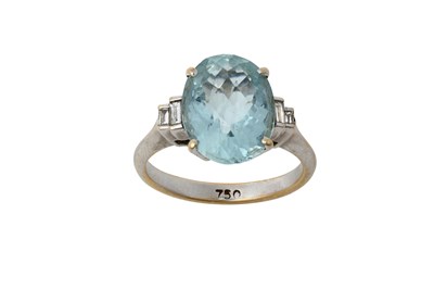 Lot 2327 - An Aquamarine and Diamond Ring the fancy oval...