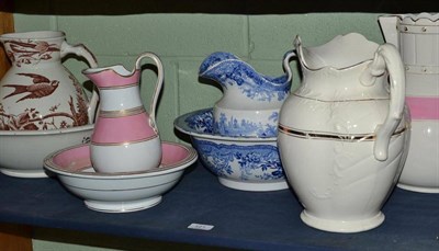 Lot 121 - Two Staffordshire jugs, two wash bowls and jugs and a blue and white jug and bowl