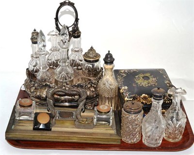 Lot 123 - Papier mache hinged box, plated cruet stand, a brass inkstand, inkwells, glass condiment...