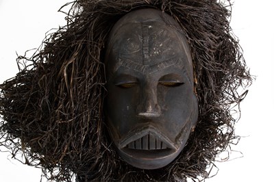 Lot 388 - A Mid-20th Century Igbo Mask, Nigeria, of...