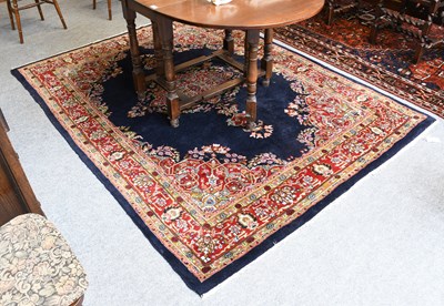 Lot 1328A - Indian Kirman Carpet, the deep indigo field...