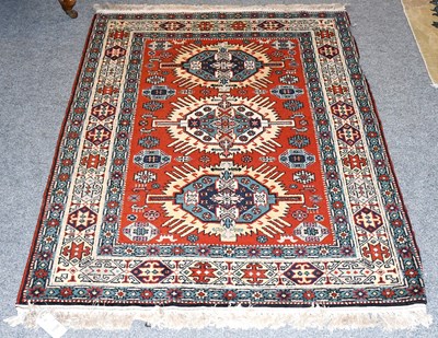 Lot 1108 - Caucasian Design Rug, the blood red field with...