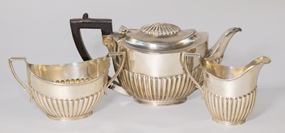 Lot 102 - A Three-Piece Victorian Silver Tea-Service, by...