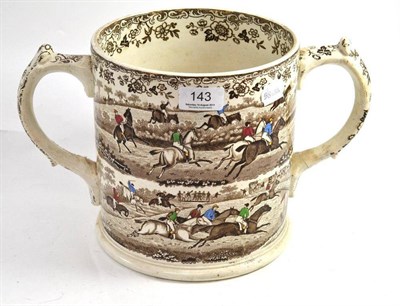 Lot 143 - An oversized 19th century loving cup, transfer printed and hand coloured with a steeple chase