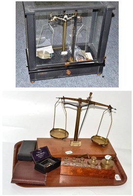 Lot 145 - A cased precision balance, another set of scales, weights etc