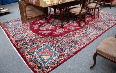Lot 1334 - Yazd Carpet, the blood red field centred by an...