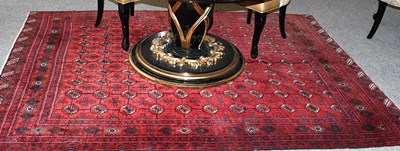 Lot 1110 - Afghan Carpet, field with rows of quartered...