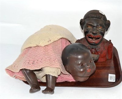 Lot 155 - A 'Jolly Nigger' money bank and an Armand Marseille doll AM351/3 1/2K (a.f.)