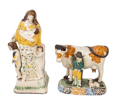 Lot 61 - A Yorkshire Prattware Cow and Cowman Group,...