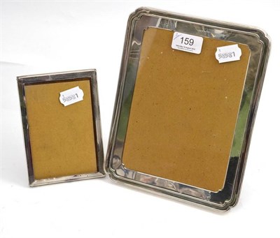 Lot 159 - A George V silver photograph frame, Birmingham 1919 and another smaller, Birmingham 1926 (2)