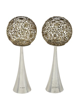 Lot A Pair of Elizabeth II Parcel-Gilt Silver Candlesticks