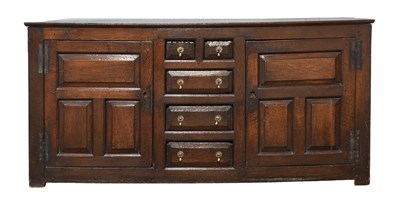 Lot 492 - A George II Oak Enclosed Dresser, early 18th...