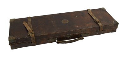 Lot 419 - A Late Victorian/Edwardian Leather Covered Oak...