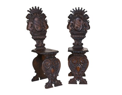 Lot 653 - A Pair of Italian Carved Walnut Sgabello-Style...