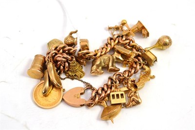 Lot 197 - A 9ct gold charm bracelet