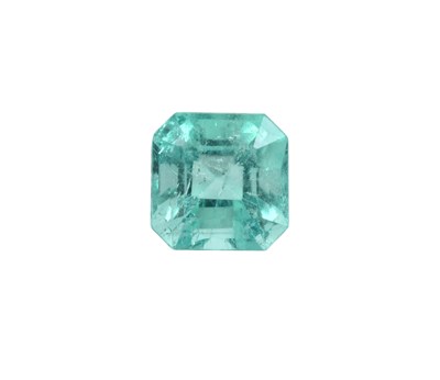 Lot 2073 - A Loose Octagonal Step Cut Emerald weighing...