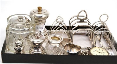 Lot 207 - A collection of silver and plate including silver salt and pepper, toast racks, albert chain,...