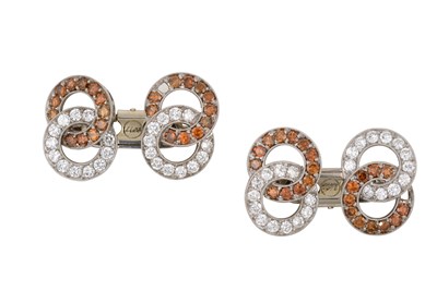 Lot 2061 - A Pair of Diamond Cufflinks modelled as figure-...