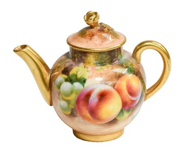 Lot 104 - A Royal Worcester Porcelain Miniature Teapot...