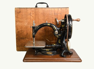 Lot 198 - A Wilcox & Gibbs Sewing Machine, USA, early...