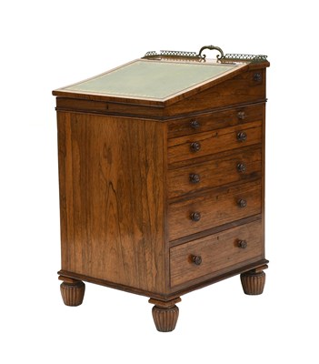 Lot 591 - A George IV Rosewood Davenport, in the manner...