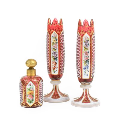 Lot 22 - A Pair of Bohemian Overlay Cranberry Glass...